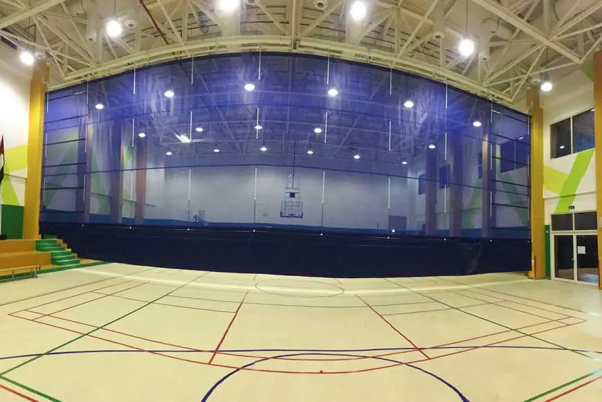 Maximizing Space and Flexibility with Roll-Up Divider Curtains: A Smart Investment